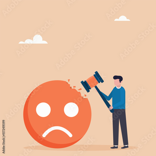 Concept of overcoming stress and negative influence. Stress resistance, victory over depression. The guy hits a sledgehammer with a negative emoticon.	