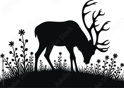 Vector art of silhouette of a stag grazing in a field of flowers isolated on white background
