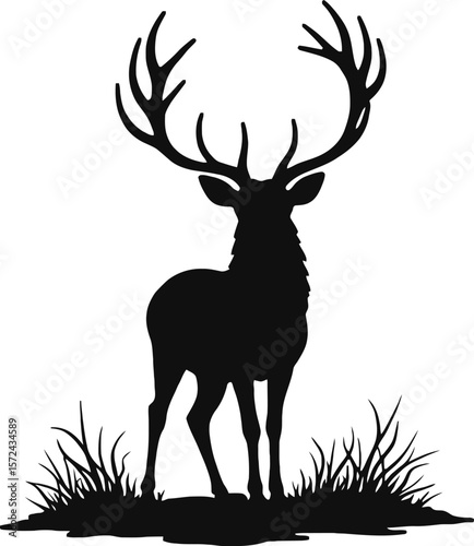Vector art of silhouette of a majestic stag with large antlers standing in grass