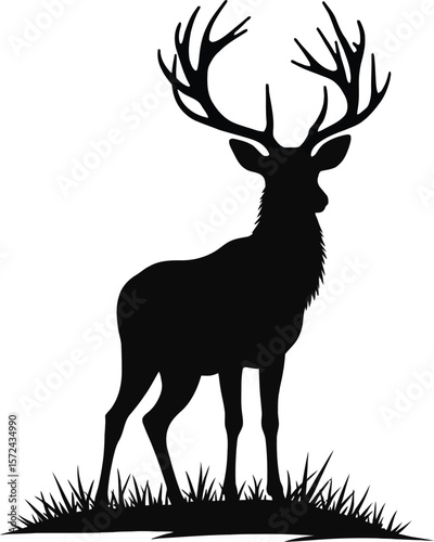 Vector art of silhouette of a majestic stag with large antlers standing in grass