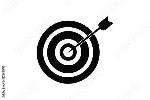 Black silhouette of an arrow hitting the bullseye of a target symbolizing success and achievement