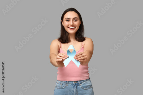 Pretty young woman with lig...