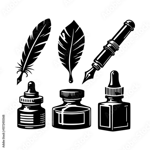 Vintage writing implements feathers ink bottles and a fountain pen