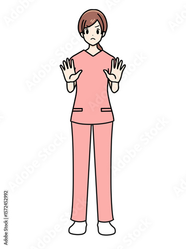 女性看護師の正面立ちポーズ　スクラブ　拒否するポーズ