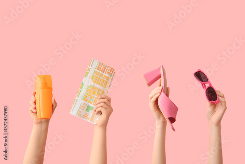 Female hands with sunscreen...