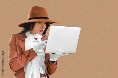 Female spy with laptop on b...