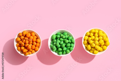 Bowls with colorful coated ...