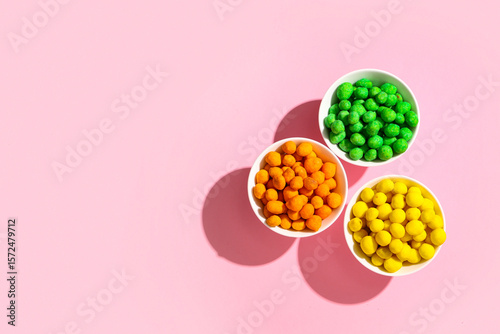 Bowls with colorful coated ...