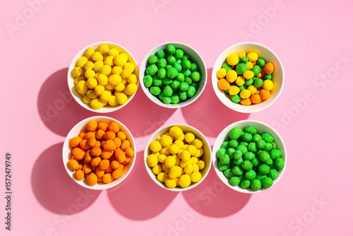 Bowls with colorful coated ...