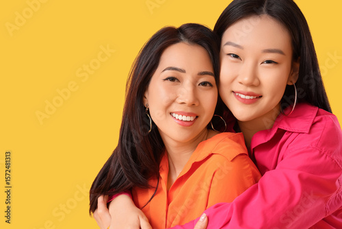 Beautiful young happy Asian...