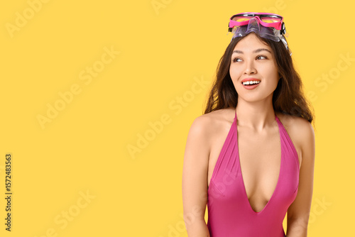 Young asian woman in pink s...