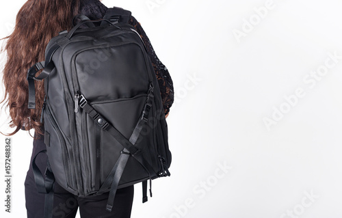 Woman holding a backpack for e-commerce product display, showcasing lifestyle and fashion for online shopping platforms