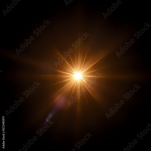 Golden light burst effect bright star flare on black background design element