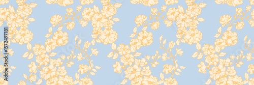Seamless floral pattern featuring yellow blossoms with delicate leaves on a blue background. Perfect for textiles, wallpaper, packaging, and stationery. Vibrant and feminine design.