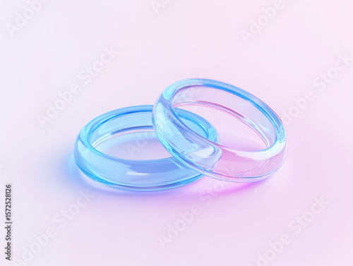 3D Transparent Blue Wedding Rings on Soft Gradient Background