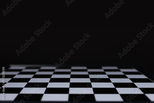 Wallpaper Mural empty chess board on dark background Torontodigital.ca