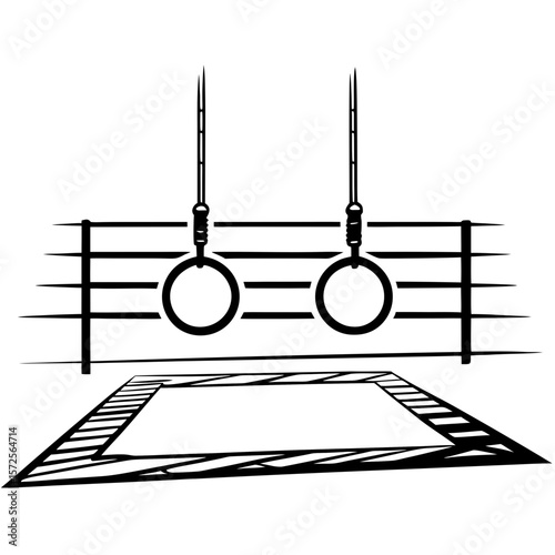 Gymnastic rings hanging from ceiling above exercise mat on floor  