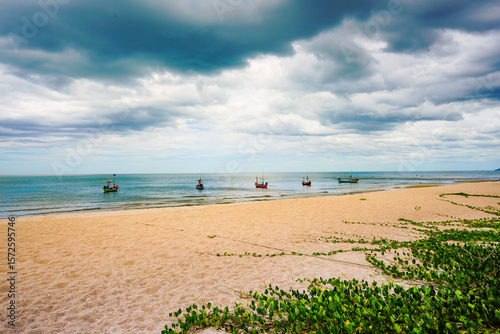 Thai wooden motorboat, boat trips at sea, Clean white sand beaches, and emerald green sea