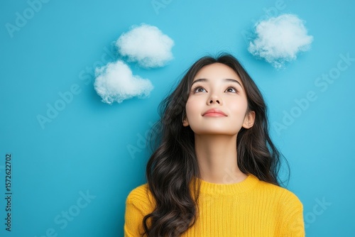 Dreamy inspiration, young Asian woman gazing upward, envisioning creative or future goals, Generative AI