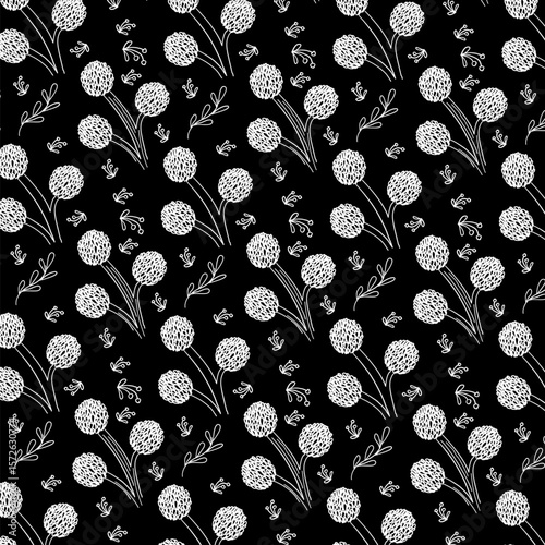 Black and white background with repeating hand drawn floral pattern. white floral pattern on black background. Circular flowers with small petals. Background, flowers.
