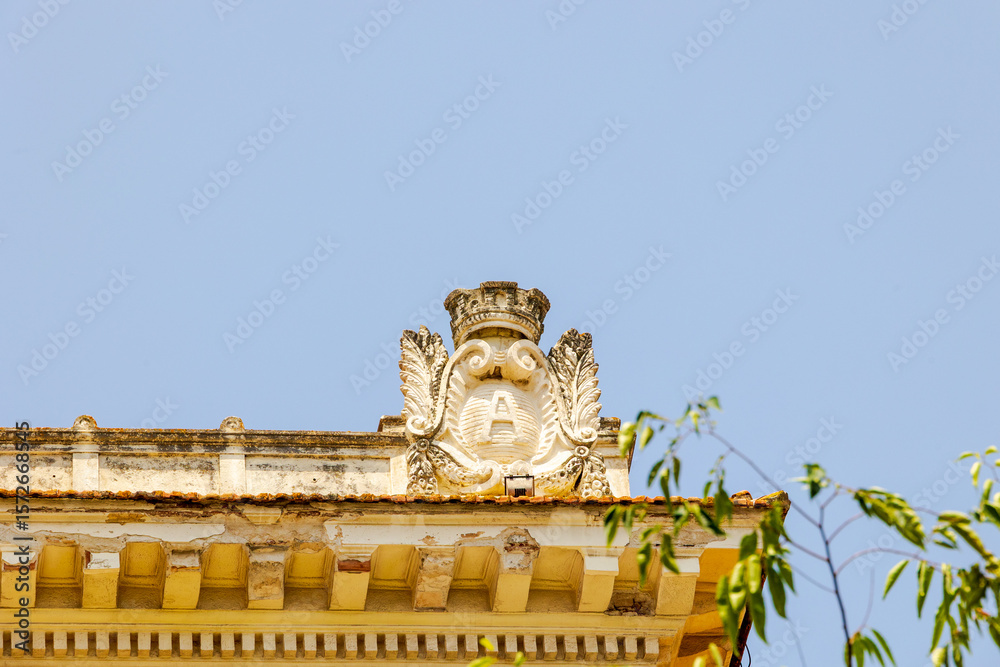 Obraz premium Architectural detail with Ajaccio crest on historic building, France, Corsica, Ajaccio, 13 June 2025