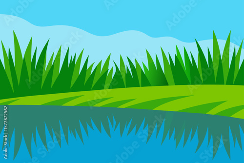 Grassy Riverbank With Lush Green Grass And Smooth Flowing Water