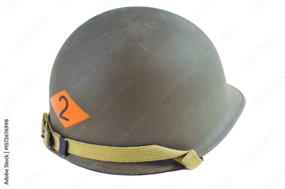 Obraz premium Replica of a World War Two American M1 helmet with 2nd Ranger Battalion marking at the back. Helmet is isolated against a white studio background.