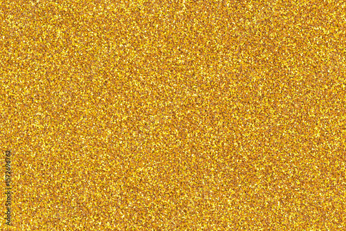 Luxurious gold glitter texture background perfect for festive, elegant, and glamorous design themes.