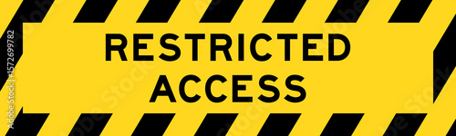 Yellow and black color with line striped label banner with word restricted access