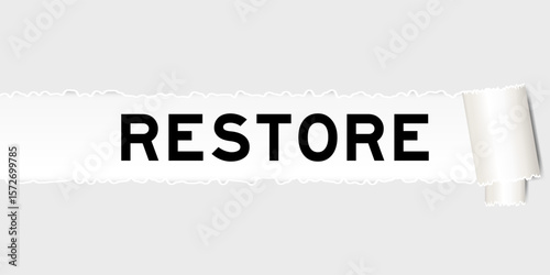 Ripped gray paper background that have word restore under torn part