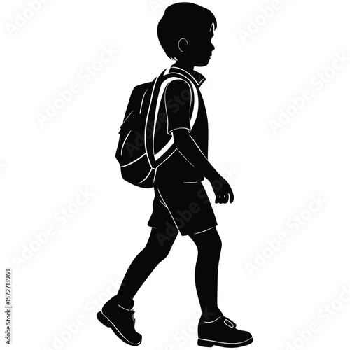 Silhouette of a schoolboy walking with backpack side view isolated on white