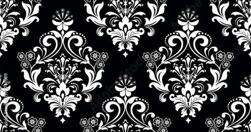 Wallpaper in the style of Baroque. White and black floral ornament. Seamless vector background. Graphic pattern for fabric, wallpaper, packaging. Ornate Damask flower illustration.