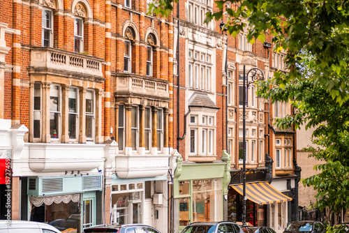 London- Street of residential British properties above commercial shops and offices
