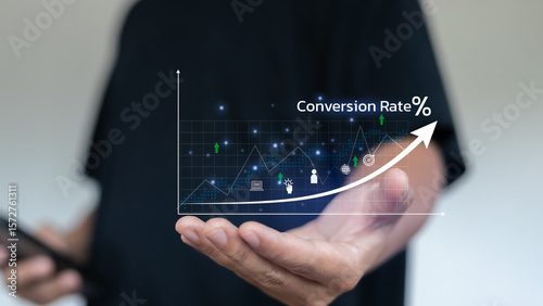 Fotografie Businessman analyzing conversion rate optimization with digital marketing analytics graph for online business growth, sales performance, and e-commerce success strategy