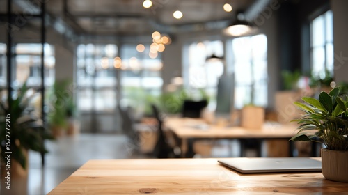 Blurred image of modern office space Modern office interior with plants and decor.