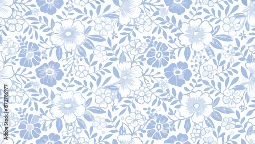 Floral pattern with light blue and white flowers and leaves in a dense arrangement design looking elegant
