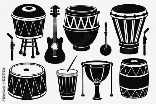 Collection of diverse musical instruments including drums and guitar in black silhouette