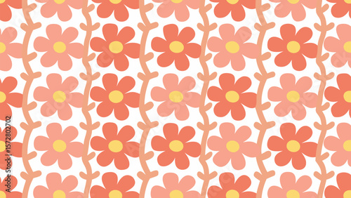 Floral pattern with orange and pink flowers and winding stems on a white background creating a repeat design