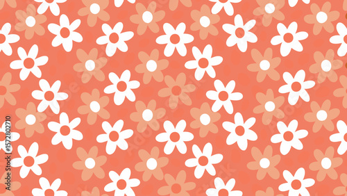 Floral pattern with white and peach flowers on a peach background creating a seamless design look
