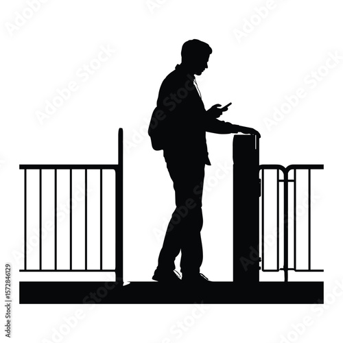 Silhouette of Man Using Smartphone at Balcony