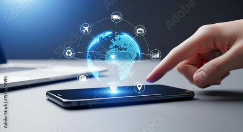 Finger tapping smartphone with holographic globe and logistics icons for global smart technology and connectivity

