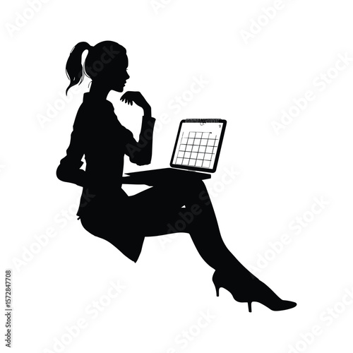 Woman Sitting with Laptop in Silhouette