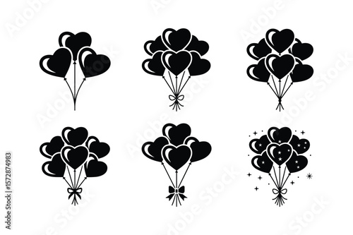 Heart shaped balloons tied with ribbons and bows heart balloons black and white