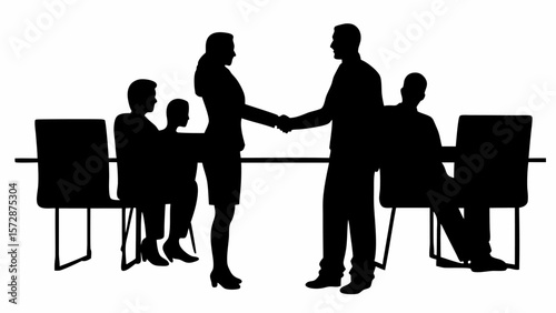 Silhouette of business people shaking hands during meeting at conference table with seated colleagues