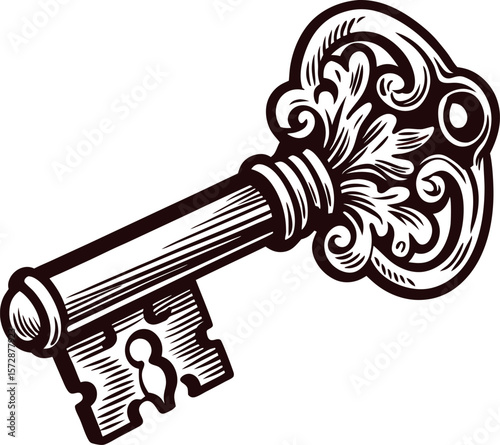 Antique ornate skeleton key with intricate vintage scrollwork engraving on bow isolated on white background