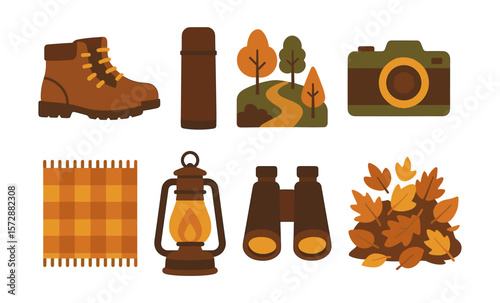 Autumn hiking essentials: boots, thermos, camera, blanket, lantern, binoculars, leaves, pathways