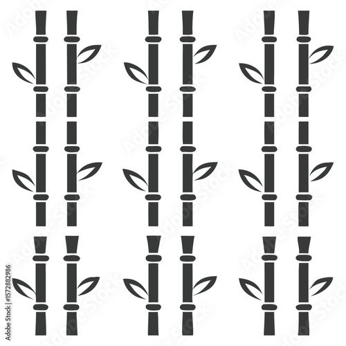Minimalist black bamboo stalks with green leaves on a white background design elements