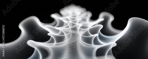 Abstract white smoke or light waves swirl on a black background, creating a futuristic and dynamic visual effect.