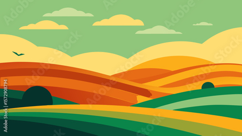 Green summer landscape with rolling hills and distant mountains under a blue sky