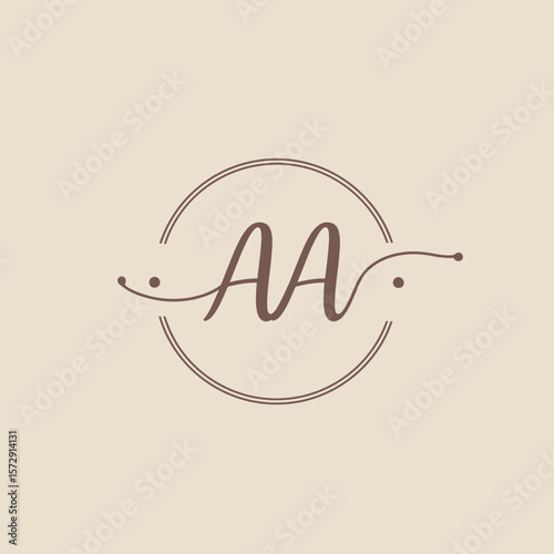Elegant AA monogram logo design featuring intertwined letters within a circular frame, perfect for branding, wedding invitations, or personalized stationery projects.